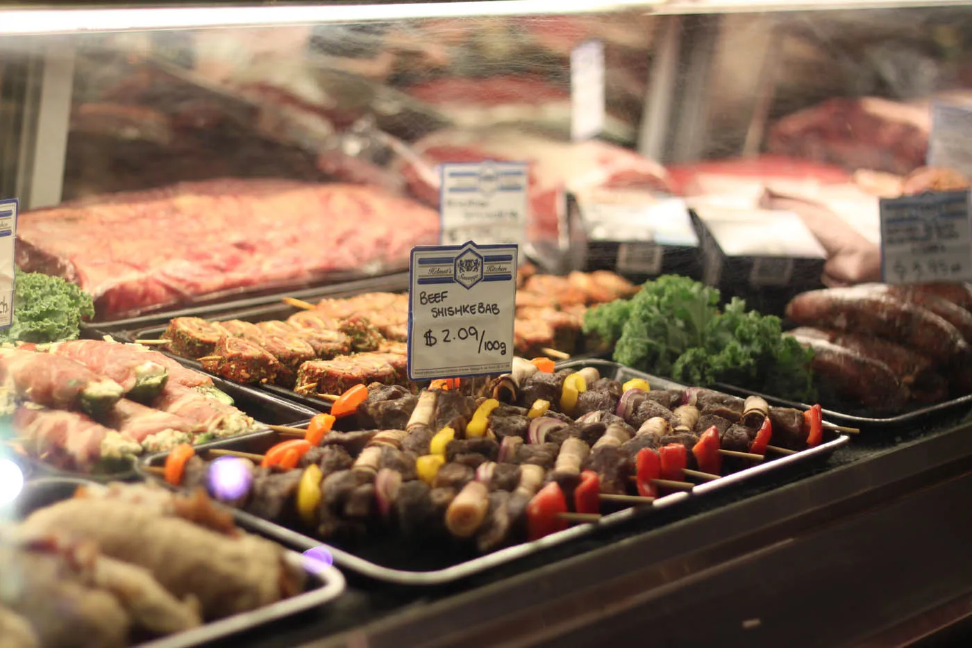 Inside Helmut's Sausage Kitchen — shelves stocked with European specialties